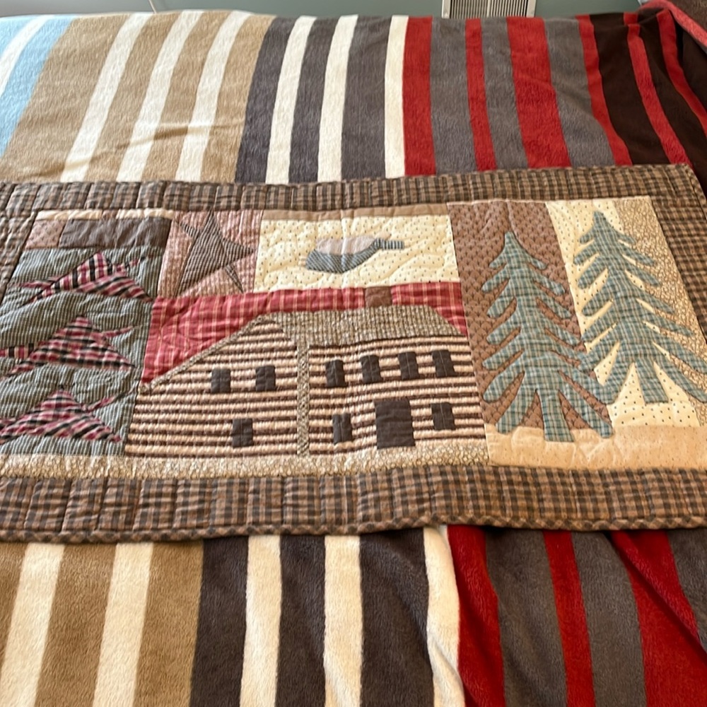 Handmade quilt wall hanging.